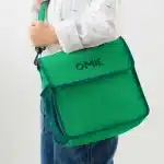 Bolso OmieTote verde lavable a máquina y plegable para OmieBox en La Mirilla Kids