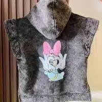 Chaleco Minnie para niñas en franela jaspeada Vista trasera del chaleco Minnie con estampado Chaleco exclusivo Minnie Mouse para niñas Detalle del estampado frontal Minnie Niña usando chaleco gris jaspeado Minnie