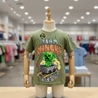 Polo Minecraft verde para niños hecho de algodón 20/1 con diseño de Creeper